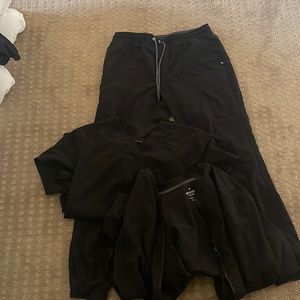 Scrub set it includes scrub joggers, shirt, and jacket